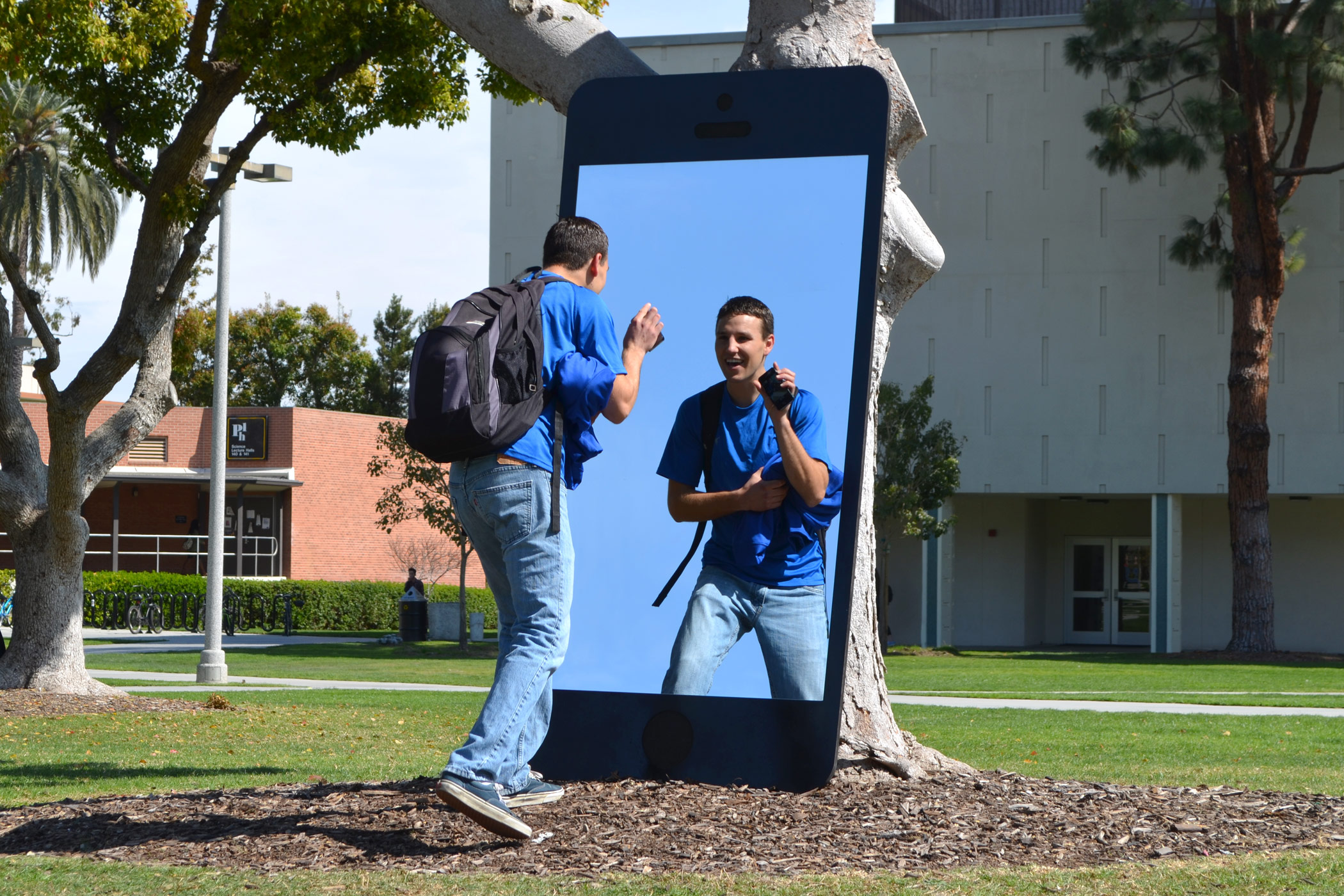 Gabe Ferreira: Screen Identity — Student taking a selfie.