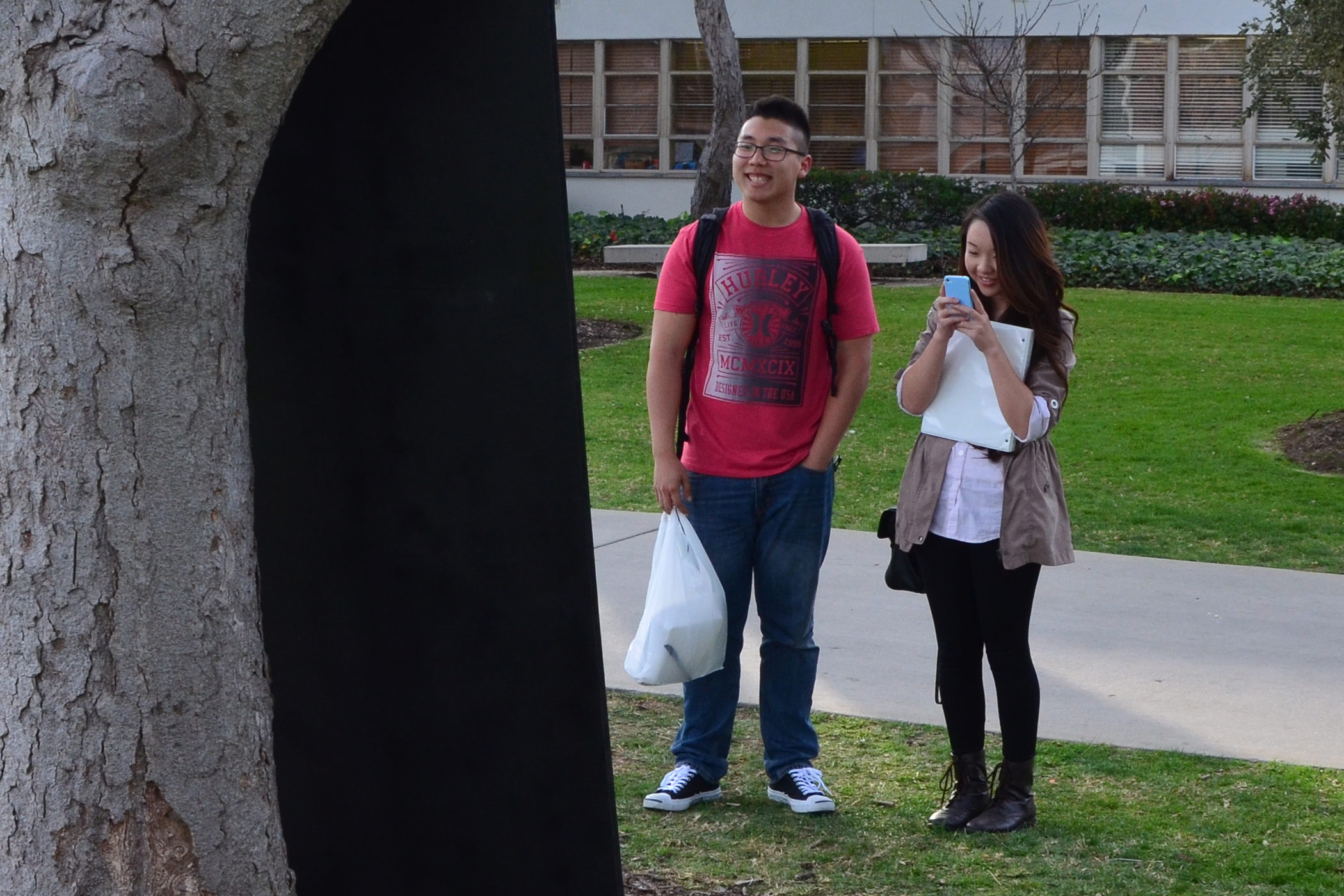 Gabe Ferreira: Screen Identity — Couple taking a selfie.